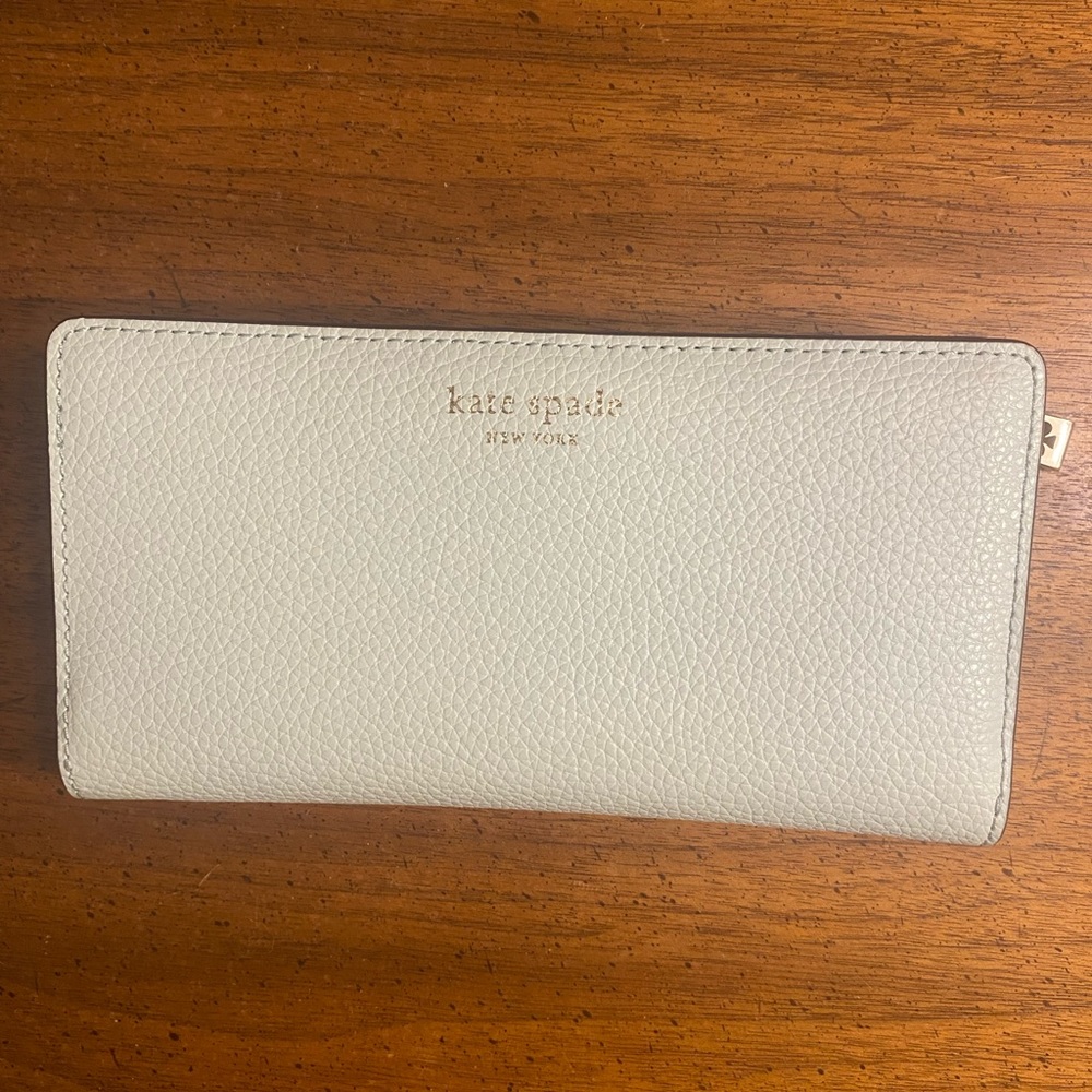 Kate Spade slim wallet, mint green/red interior, snap closure